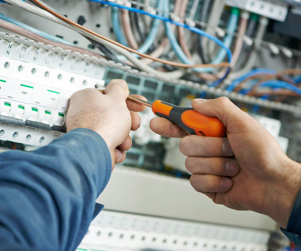 A person holding some tools in their hands