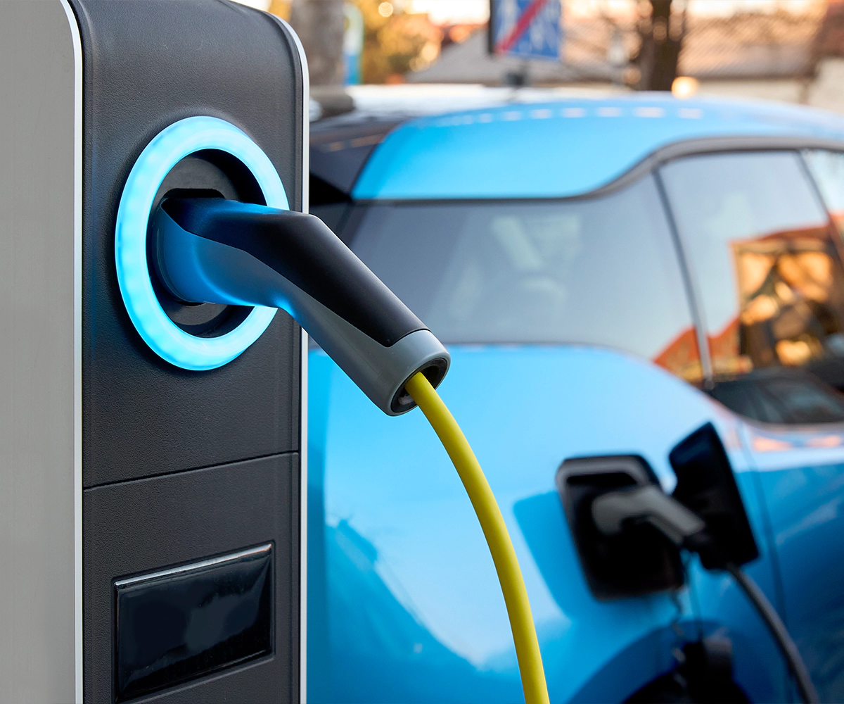 A close up of an electric car charging