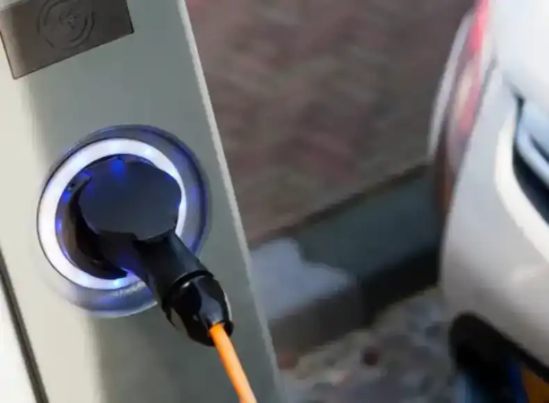 A close up of an electric car charging